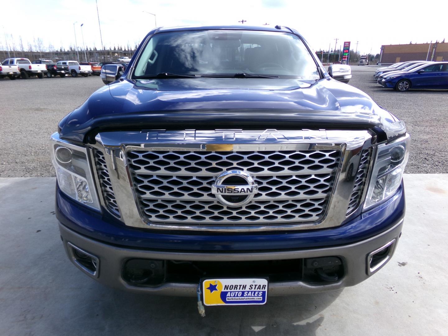 2017 /Black Nissan Titan Platinum Reserve Crew Cab 4WD (1N6AA1E52HN) with an 5.6L V8 DOHC 32V engine, 6A transmission, located at 2630 Philips Field Rd., Fairbanks, AK, 99709, (907) 458-0593, 64.848068, -147.780609 - Photo#1